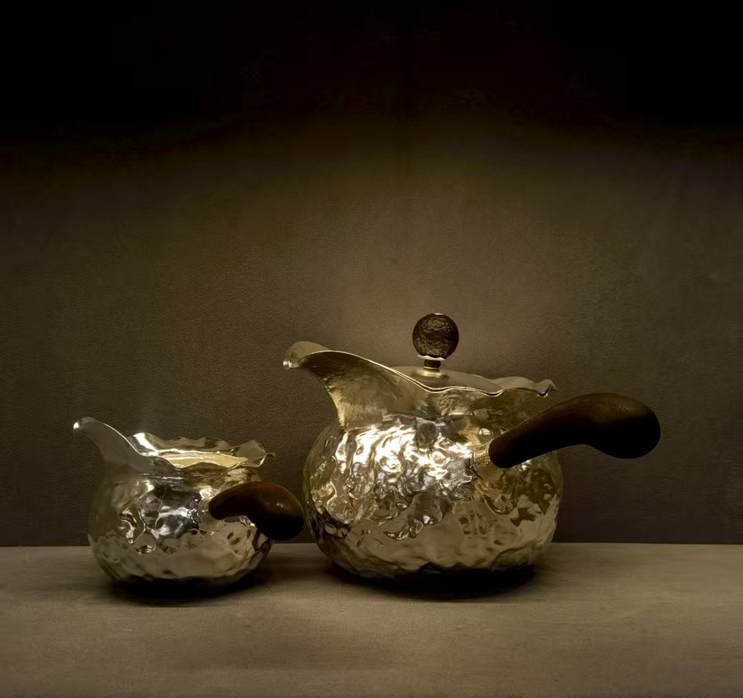 7. 高纯度银一片锻打零焊接银壶《乾坤袋》.jpg 7. 高纯度银一片锻打零焊接银壶《乾坤袋》.jpg